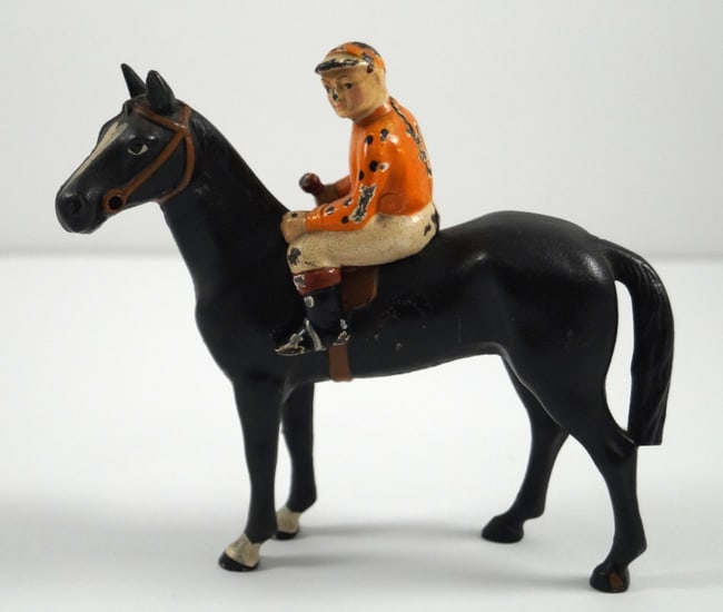 Horse & Jockey Cast Iron Hubley Toy Paperweight: Title: Horse & Jockey Cast Iron Hubley Toy Paperweight Dimension: 4 7/8" tall including jockey x 5 1/4" wide. Date: Ca. 1930's. Additional Information: OFF TO THE RACES!! Wonderful Thoroughbred Horse