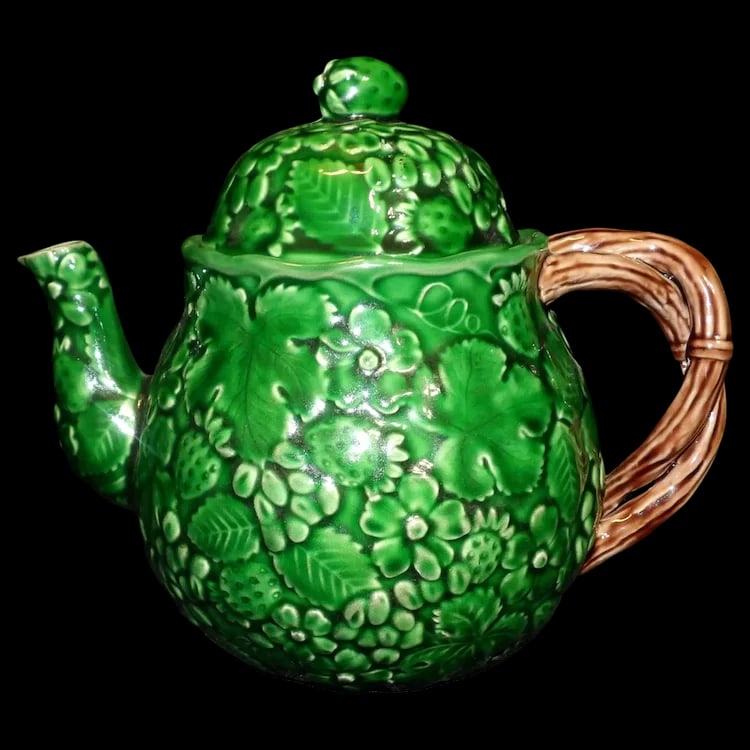 Haddon Group 1983 Green Strawberry Leaves and Flowers Teapot: This Haddon Group 1983 Green Strawberry Leaves and Flowers Teapot is in near MINT condition. It appears to never have been used except for display. The estate it came from had several teapots used