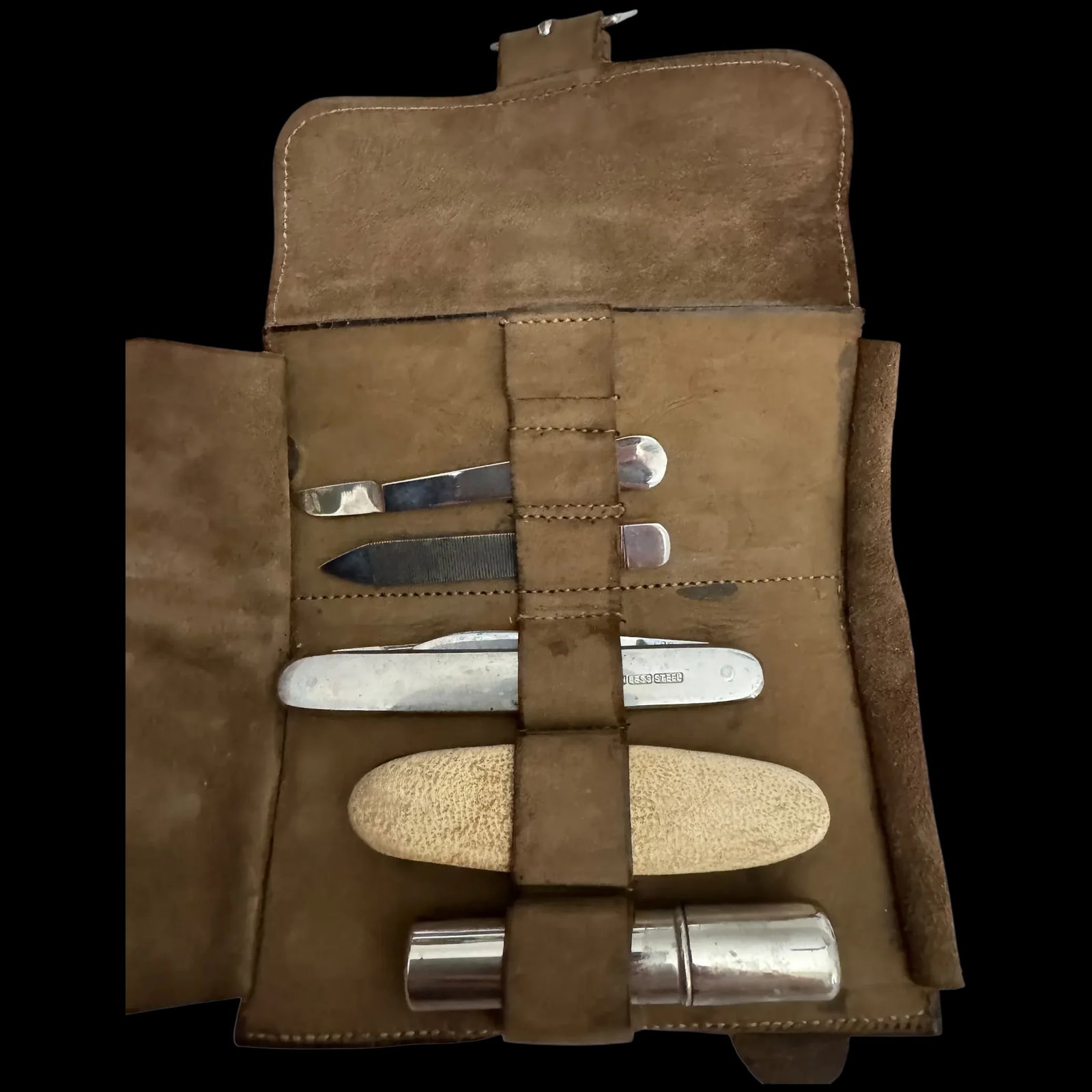 Vintage Sheffield travel grooming or manicure kit Leather early 1900s: All Products Visual matches Visually searched image antique Thinking Searching Very soft very old stamped Sheffield This item is an antique or vintage travel grooming or manicure kit, typically from