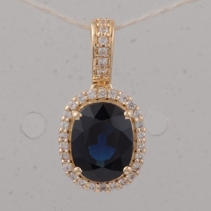 1.68 Ct Oval Emerald 9K Gold Pendant: 1.68 Total Carat Emerald 9K Gold Pendant Specifications: Total Weight 1.02 g Center Gemstone Emerald Gemstone Carat Weight 1.53 Carats Gemstone Measurements 8.20X5.80X3.90 mm Additional Gemstones
