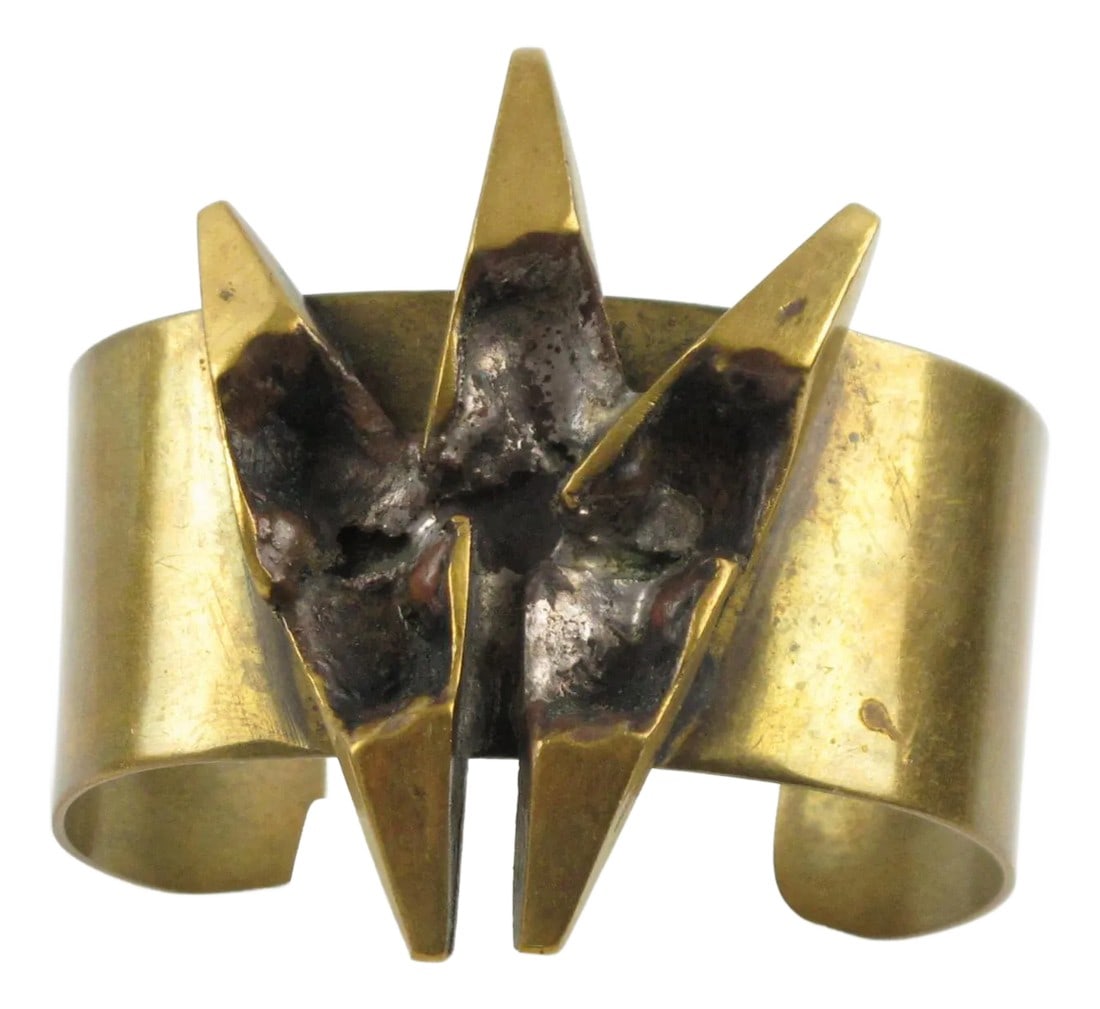 French Sculptor Henri Nogaret 1960s Brutalist Bronze Cuff Bracelet: Impressive sculptural brutalist bronze cuff bracelet by French sculptor and painter, Henri Nogaret (1927 -). The large bronze band is topped with a modernist abstract sculpture ornament. Signature
