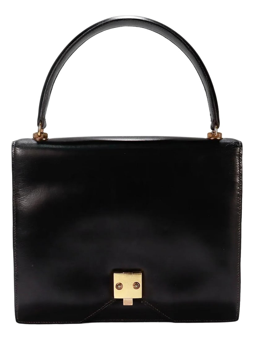 Vintage 1950s Hermes "Sac G8" Handbag in Black Box Leather: A rare 1950s Hermes bag. By Hermes. In Black Box calf leather with gold plated hardware. In the rare G8 form. An elegant and practical take on the classic envelope bag, halfway between the
