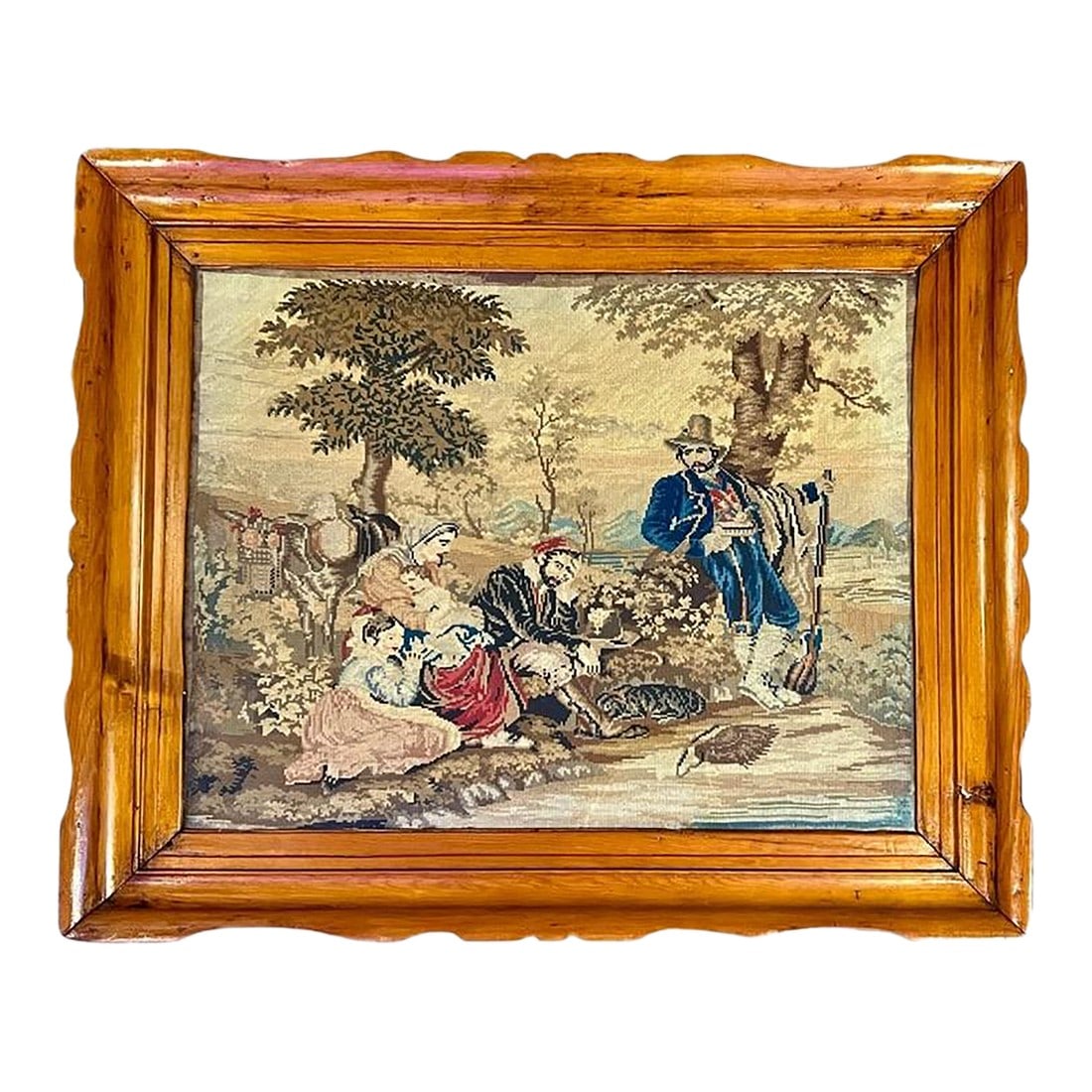Antique Framed Needlepoint Scene-Hand Carved Pine-Victorian English 1800s-Art: Large antique hand-stitched needlepoint set in a richly hand-carved pine frame, circa late 19th century. The pastoral scene features travelers and a hunter at rest, executed in fine wool on canvas.