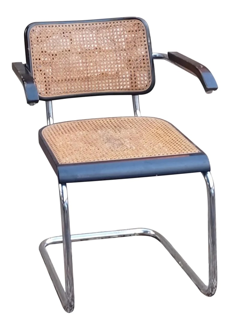 Mid Century Original Cesca Chair Made in Italy: The Cesca cantilevered, cane chair is iconic in furniture design. This nearly 100-year old design is considered one of the top ten most important designs of the 20th Century. This design features
