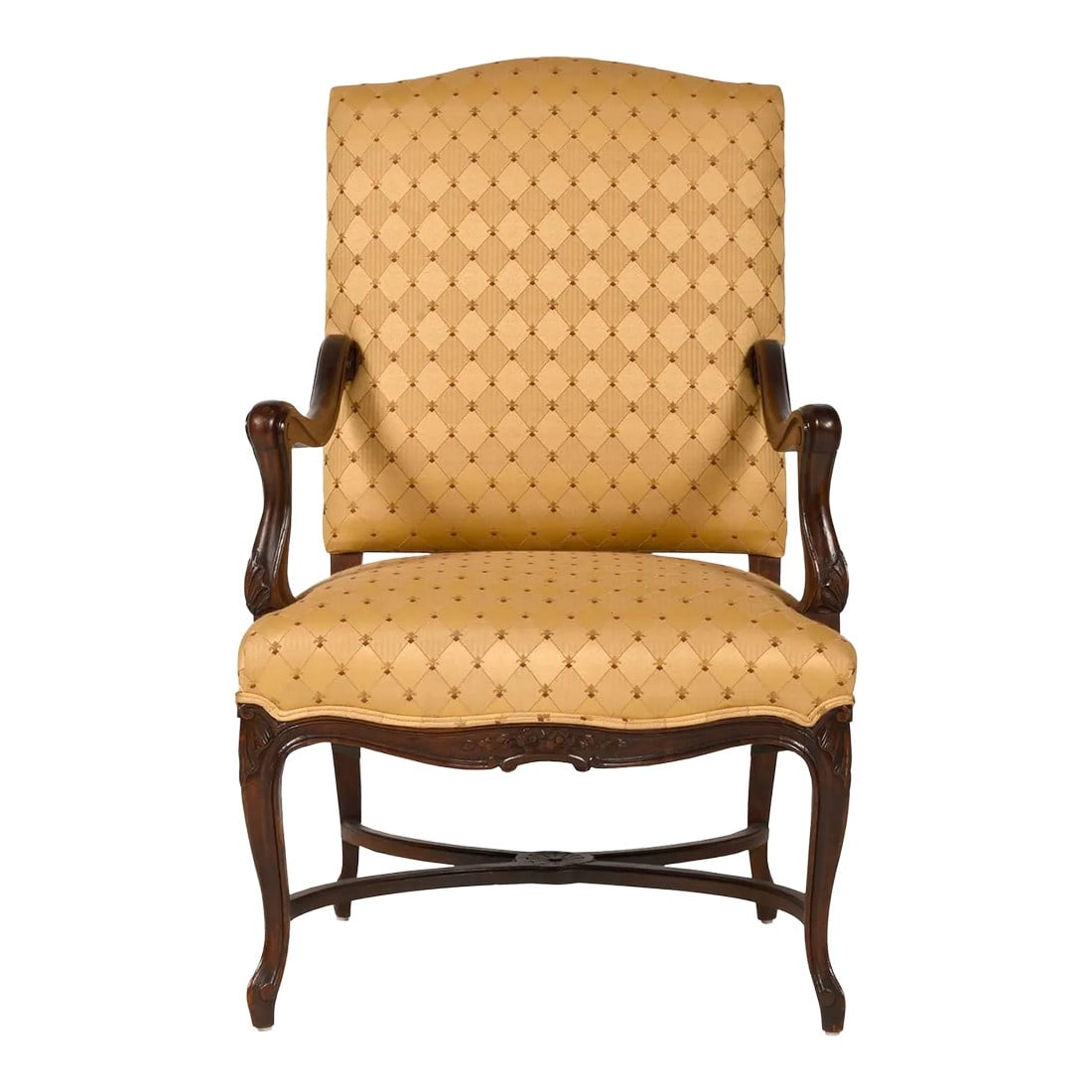 19th Century Louis XV Style Walnut Upholstered Armchair: Oversize Louis XV open-arm chair, constructed from European walnut wood. It has been reupholstered with fleur-de-lis and gold diamond pattern fabric. The arms and legs have been intricately carved tru