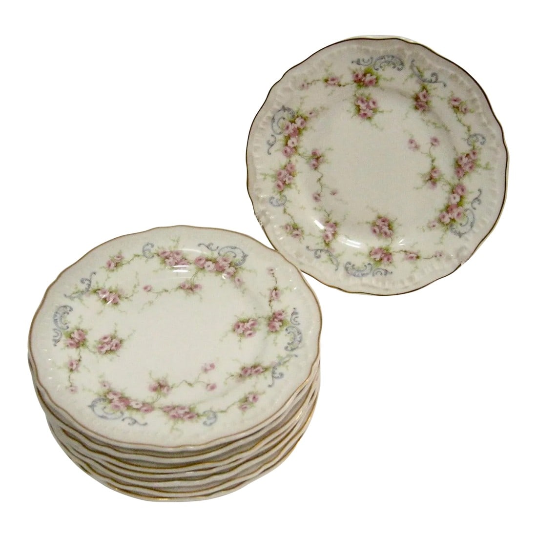 Early 20th Century Floral Haviland Dessert Plates, Set of 8: We have listed a very special set of rare Theodore Haviland (Limoges) made in America dessert plates .Beautifully adorned with clusters of pink roses, green branches and soft blue ribbons the plates