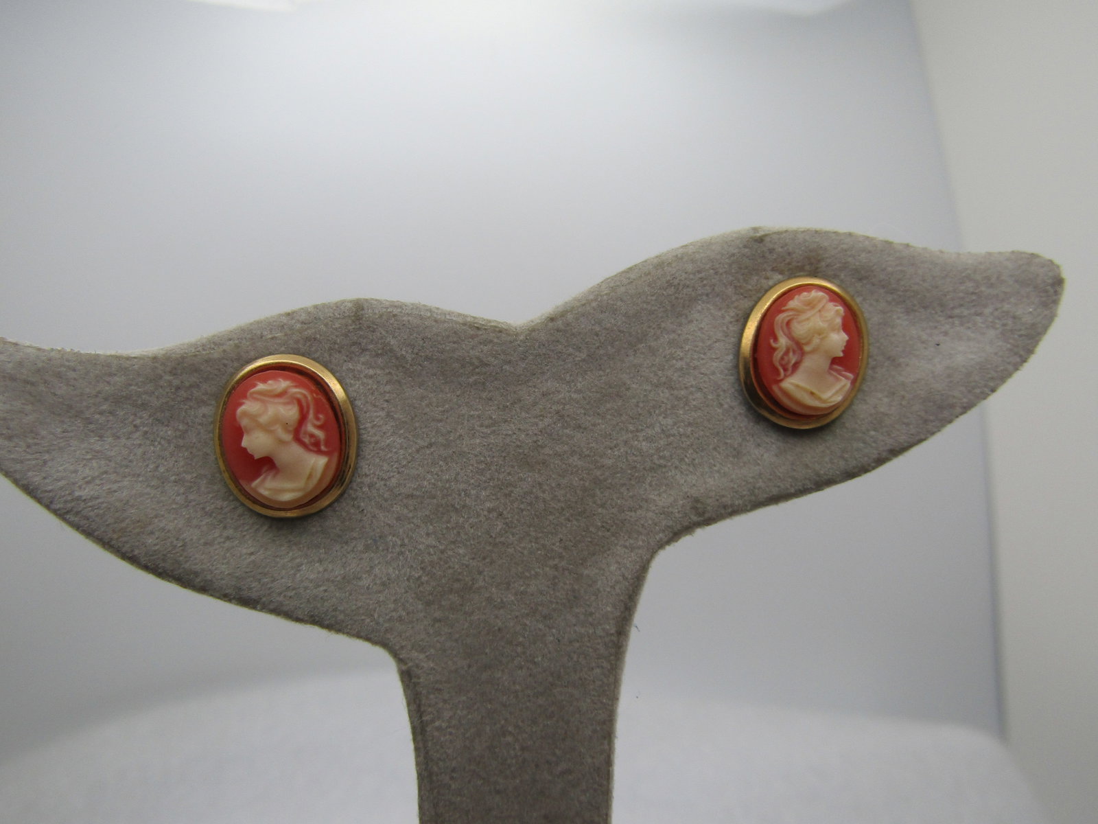 Vintage Cameo Earrings, Pierced, Gold Tone, 1960's-1970's: Vintage Cameo Earrings, Pierced, Gold Tone, 1960's-1970's. They are appx. 1/2" tall and 1/3" wide with a bold tone frame around the cameo. They are not signed or marked. Godo to Very good condition.