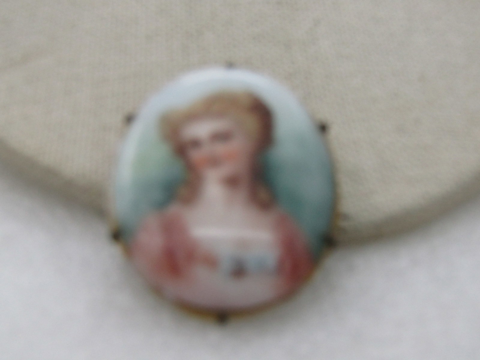 Victorian Painted Portrait Cameo Brooch, 1800's, C-Clasp: Victorian Painted Portrait Porcelain Brooch, 2.5", Gold Painted Frame, 1800's. 1.5" tall and 1.25" wide oval. Six pointed prongs holding the porcelain on the brass backing. Not signed, very good vinta