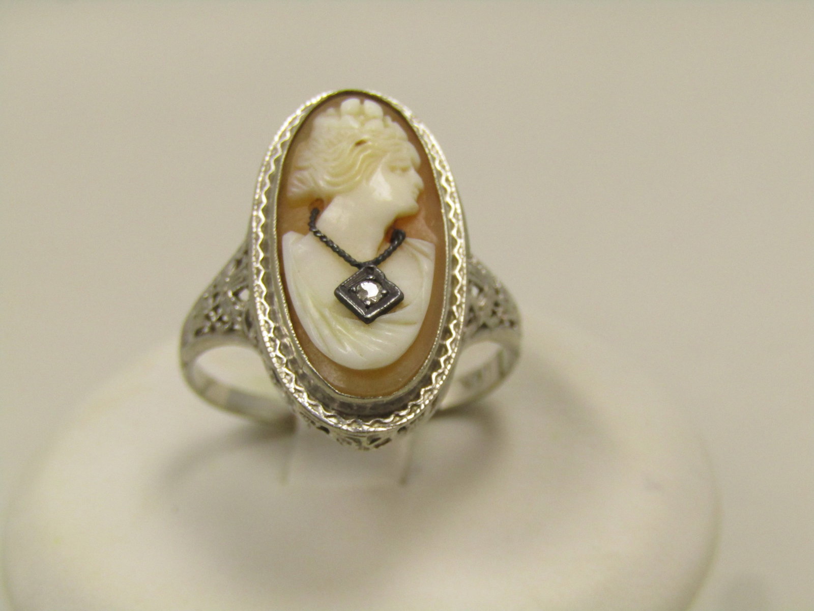 Vintage 14kt Cameo Diamond Ring, Sz. 6.75, Early 1900's: Vintage 14kt Cameo Diamond Ring, Sz. 6.75, Early 1900's. Estimated at Victorian to 1930's. The has a carved shell cameo with a diamond necklace. The ring is appx. 20.8mm down the finger and 15.5mm acr