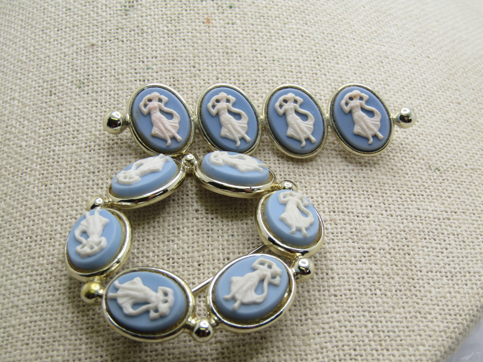 Vintage Circle & Bar Cameo Brooch Set, Blue & White , 1960's-1970's: Vintage Circle & Bar Cameo Brooch Set, Blue & White , 1960's-1970's. Faux Jasperware blue and white plastic molded cameos - silver tone bar and circle brooches. The bar is appx. 2.5" wide and 3/4" tal