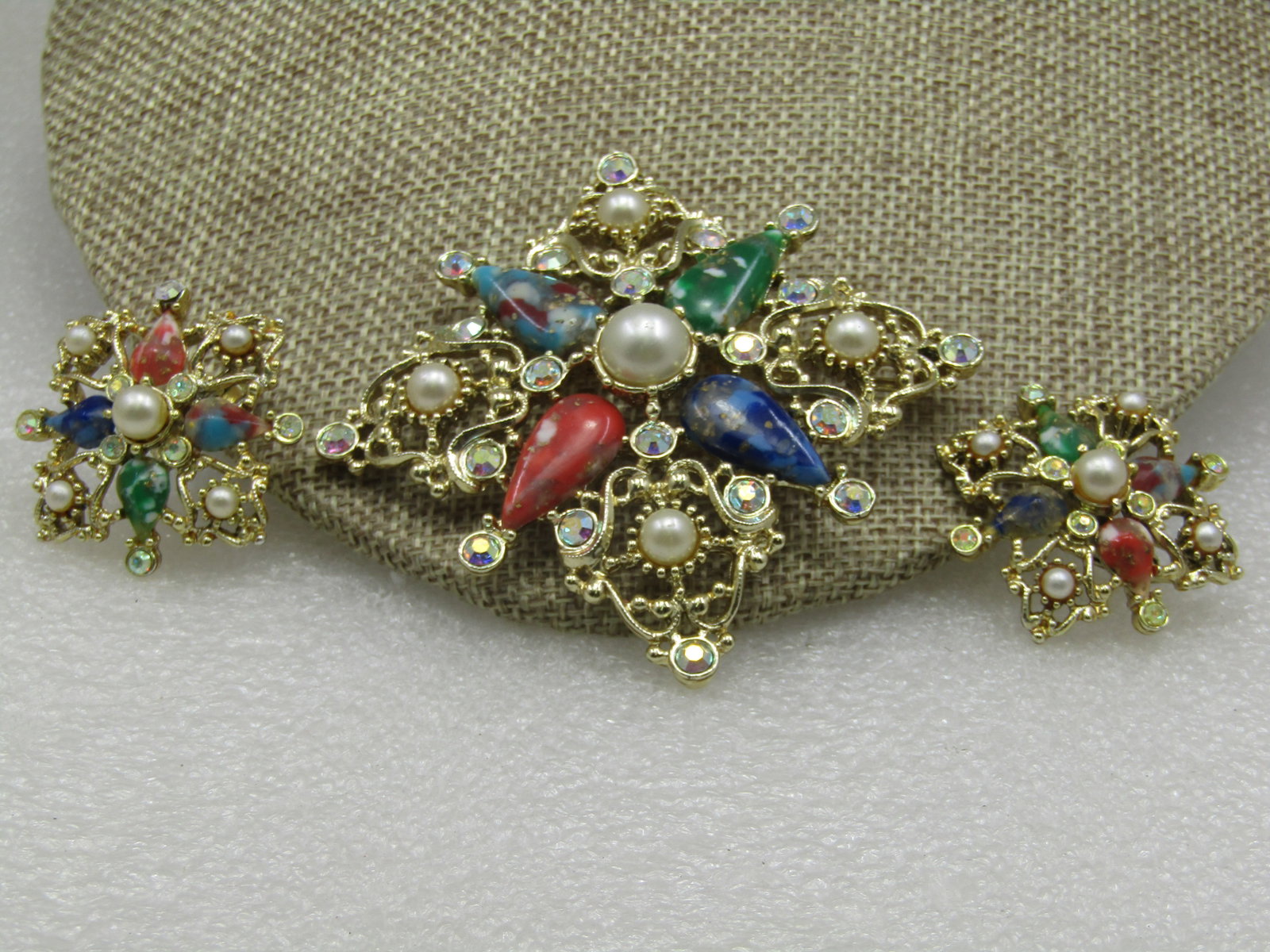 Vintage Sarah Coventry "Galaxy" Brooch with Hook & Earrings Set: Vintage Sarah Coventry "Galaxy" Brooch with Hook & Earrings Set, 1960's-1970's. Faux marbelized gemstones with faux pearls and aurora borealis rhinestones. The brooch is appx. 2-1/8" down the four sid