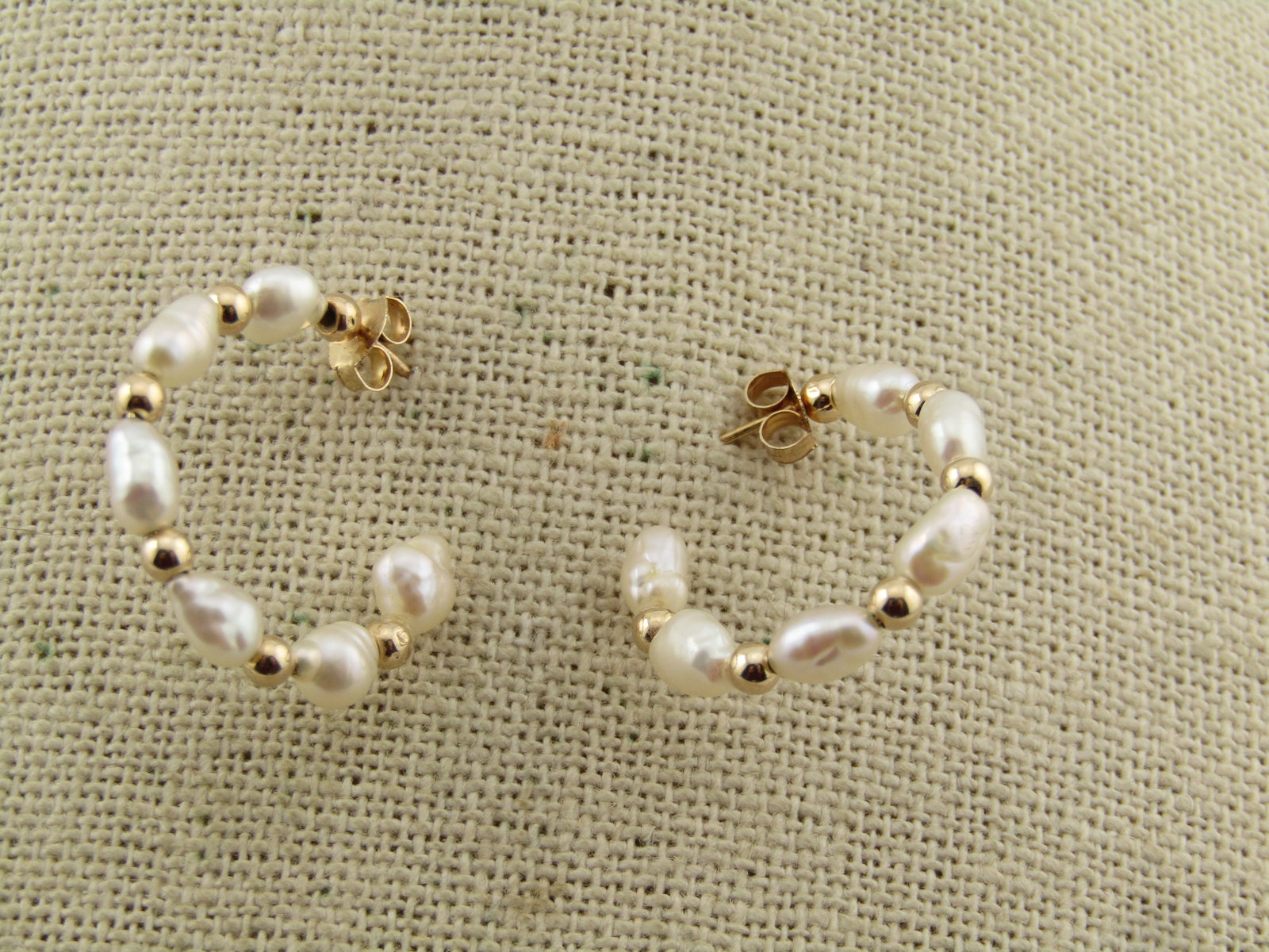14kt Freshwater Pearl Gold Bead Earrings, Hoop, 1980's: 14kt Freshwater Pearl Gold Bead Earrings, Hoop, 1980's. These are a 3/4 hoop with an open space at the back of the earring. The earrings are appx. 1" tall and wide. They are marked 14kt and test as 14