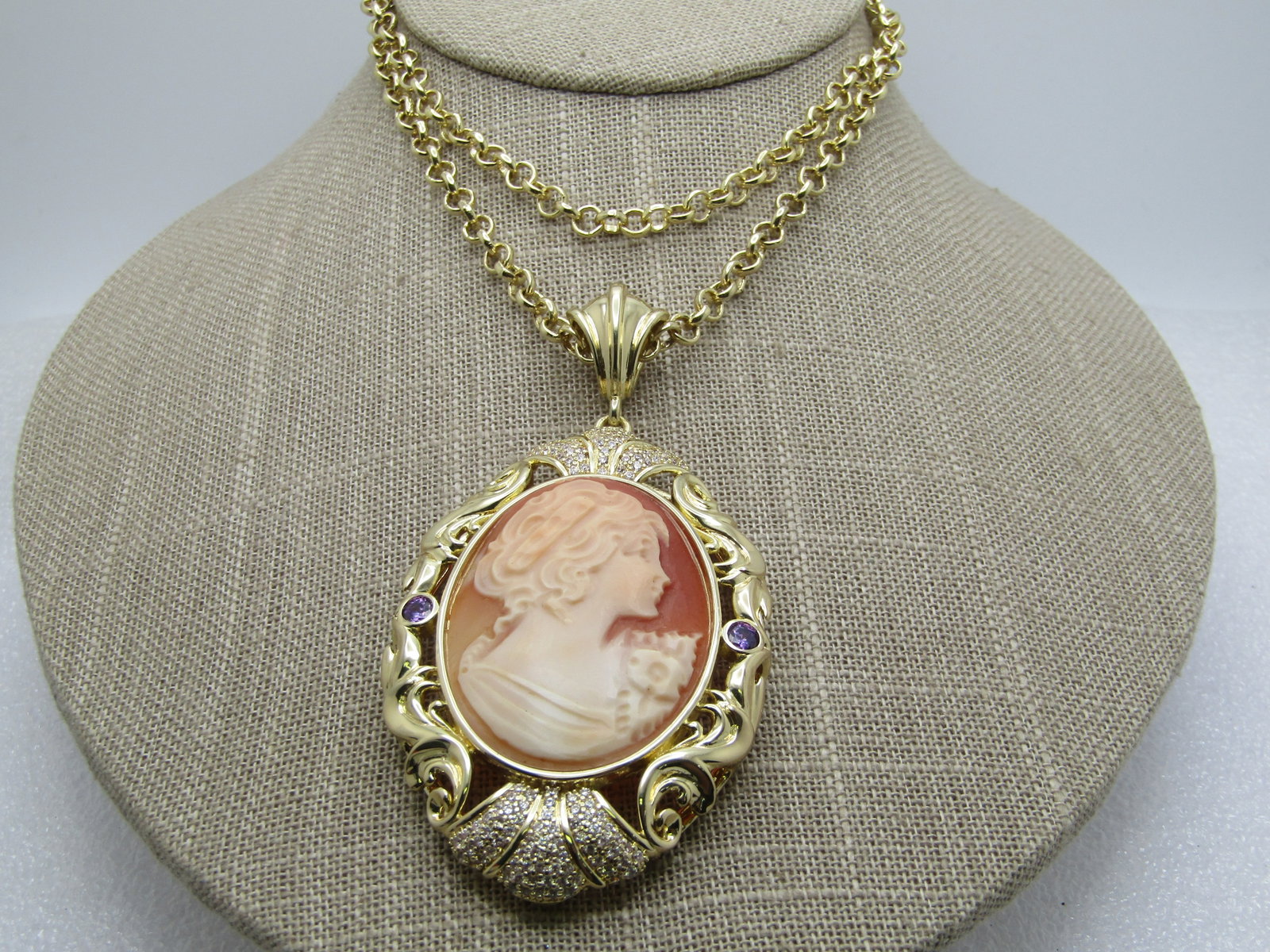 Vintage Carved Cameo Rhinestone Necklace, Signed Amedeo, 1970's-1980's: Vintage Carved Cameo Rhinestone Necklace, Signed Amedeo, 1980's-1990's. This is a large cameo pendant with a wide elaborate bail. It is appx. 3.5" tall and 1.75" wide. It has pail pink pave-set