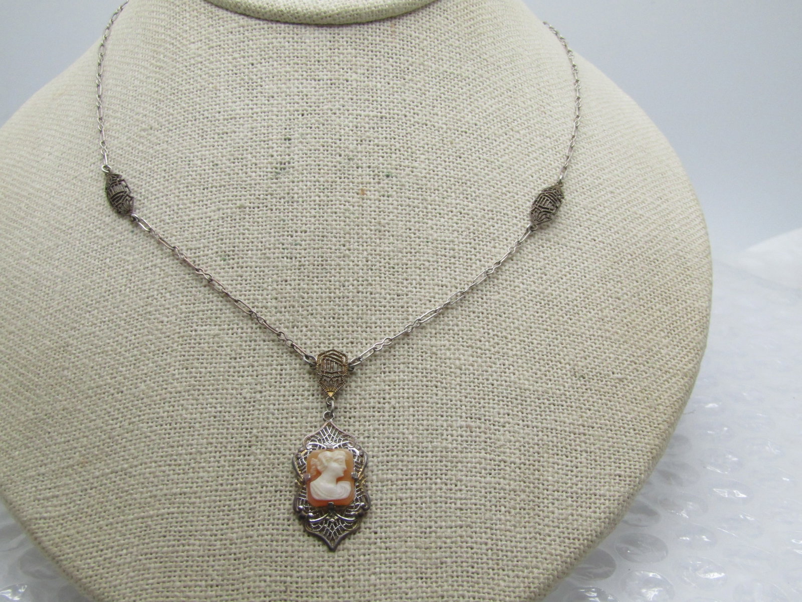 Vintage Sterling Filigree Cameo Lavalier Necklace , 17", Signed H: Vintage Sterling Filigree Cameo Lavalier Necklace , 17", Signed H. It is signed H on its side with a triangle on the left and right side. It is marked sterling. It has been tested and the weight is ap