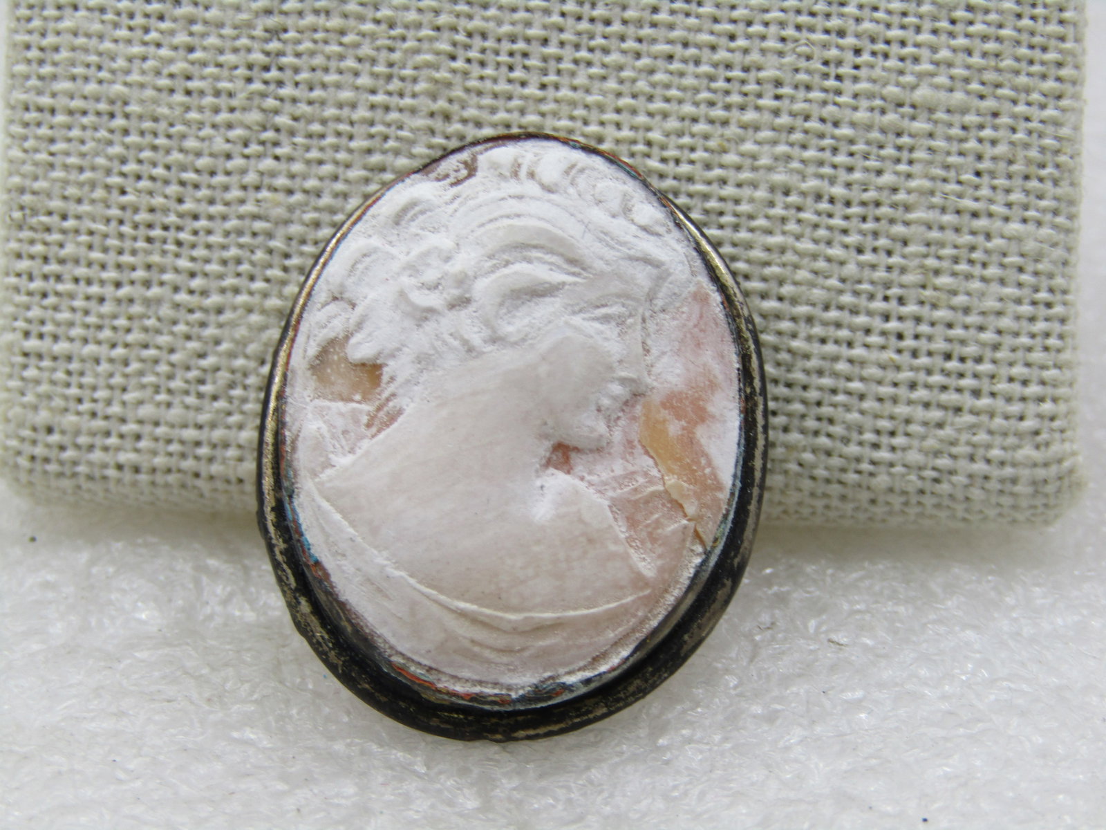 Vintage Silver Tone Cameo Brooch Pendant, 1920's-1930's, 1.25": Vintage Silver Tone Cameo Brooch Pendant, 1920's-1930's, 1.25" by slightly over 1" wide. It has a bail on the top back of the rame to add a jump ring to use as a pendant and has a locking clasp. It is