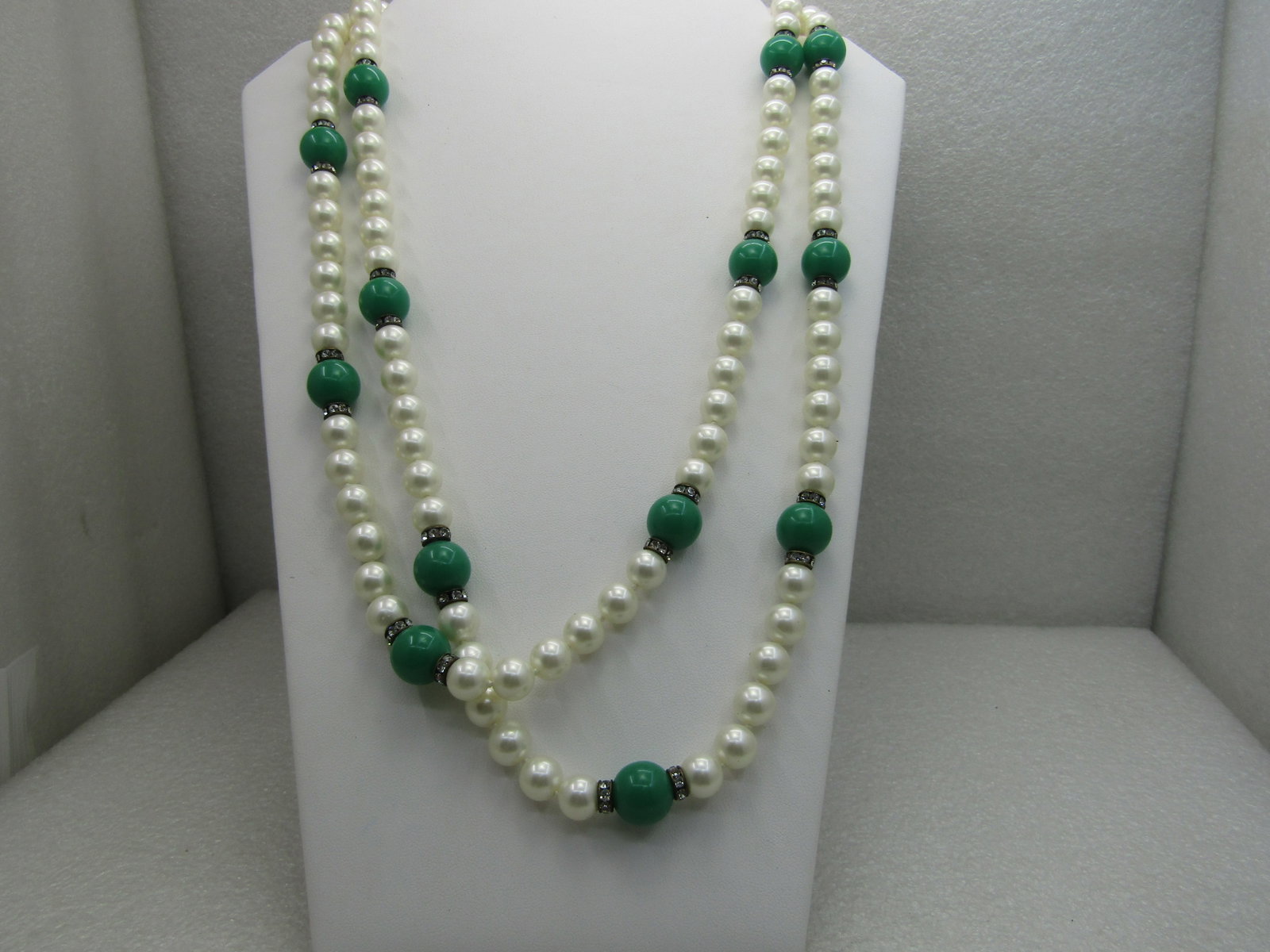 Vintage 52" Faux Pearl & Faux Jade Necklace with Rhinestone Rondelles: Vintage 52" Faux Pearl & Faux Jade Necklace with Rhinestone Rondelles , faux pearls are appx. 8mm and knotted between - 13.5mm jade colored plastic beads are spaced around the necklace with a 7mm rhin