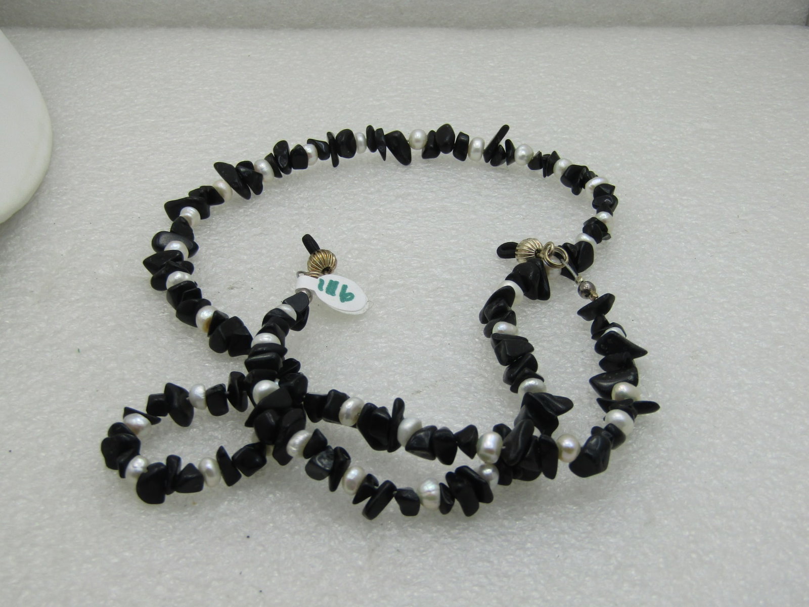 Black Quartz and Faux Pearl Eye Beaded Necklace Eyeglass Holder 32": Black Quartz and Faux Pearl Eye Beaded Necklace Eyeglass Holder. 32" long - nice Southwestern look - unisex. Looks new. Very good condition. Inv.W.5.235.1X1 (8/31) Reserve: $30.00 Shipping: Domestic: 