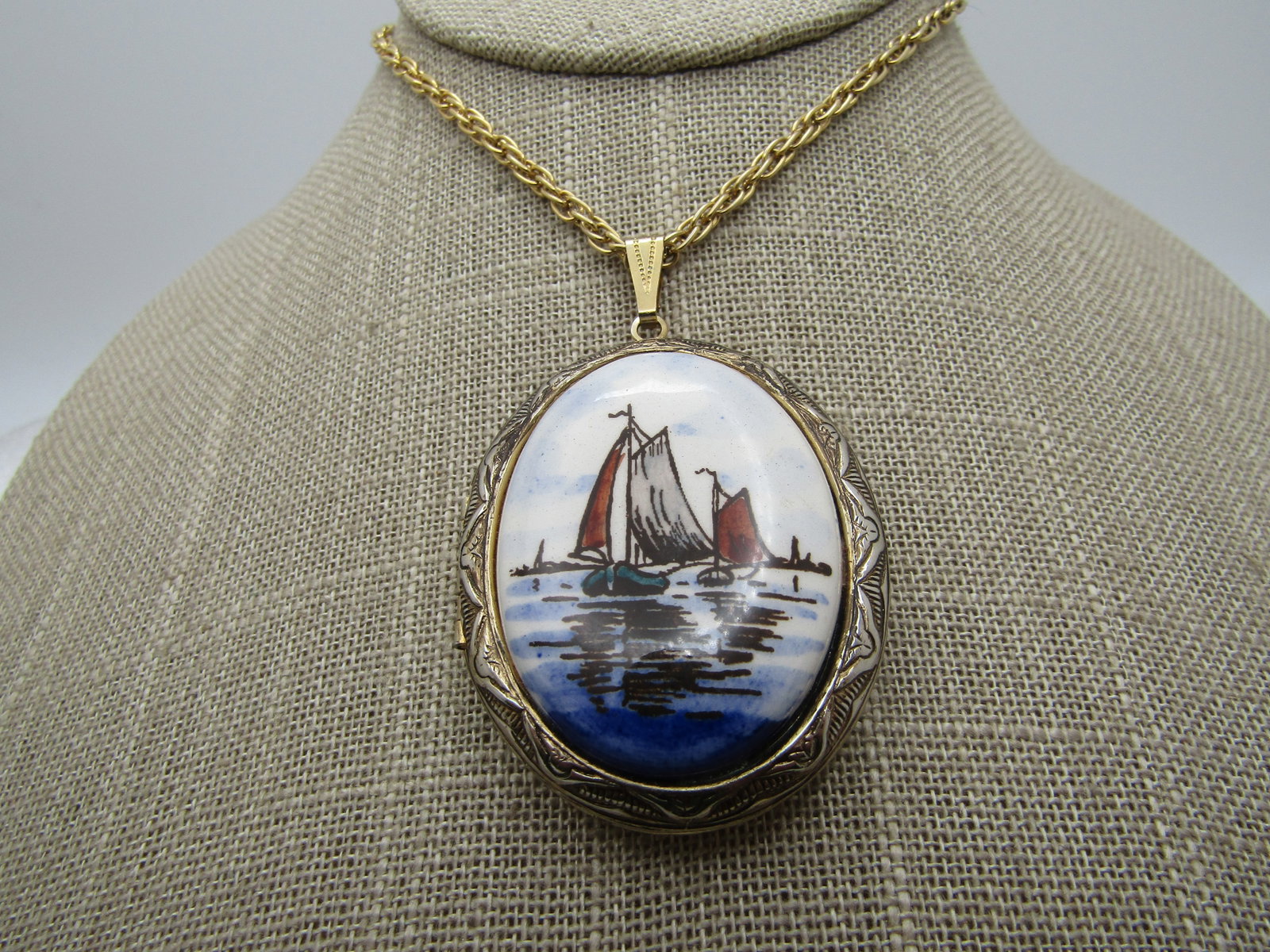 Vintage Painted Ships Locket Necklace, 24", 1960's: Vintage Painted Ships Locket Necklace, 24", 1960's. The pendant is a cameo style in that it has a cover that has a painted scene of two ships on the water. The pendant is appx. 2.25" tall with the swi