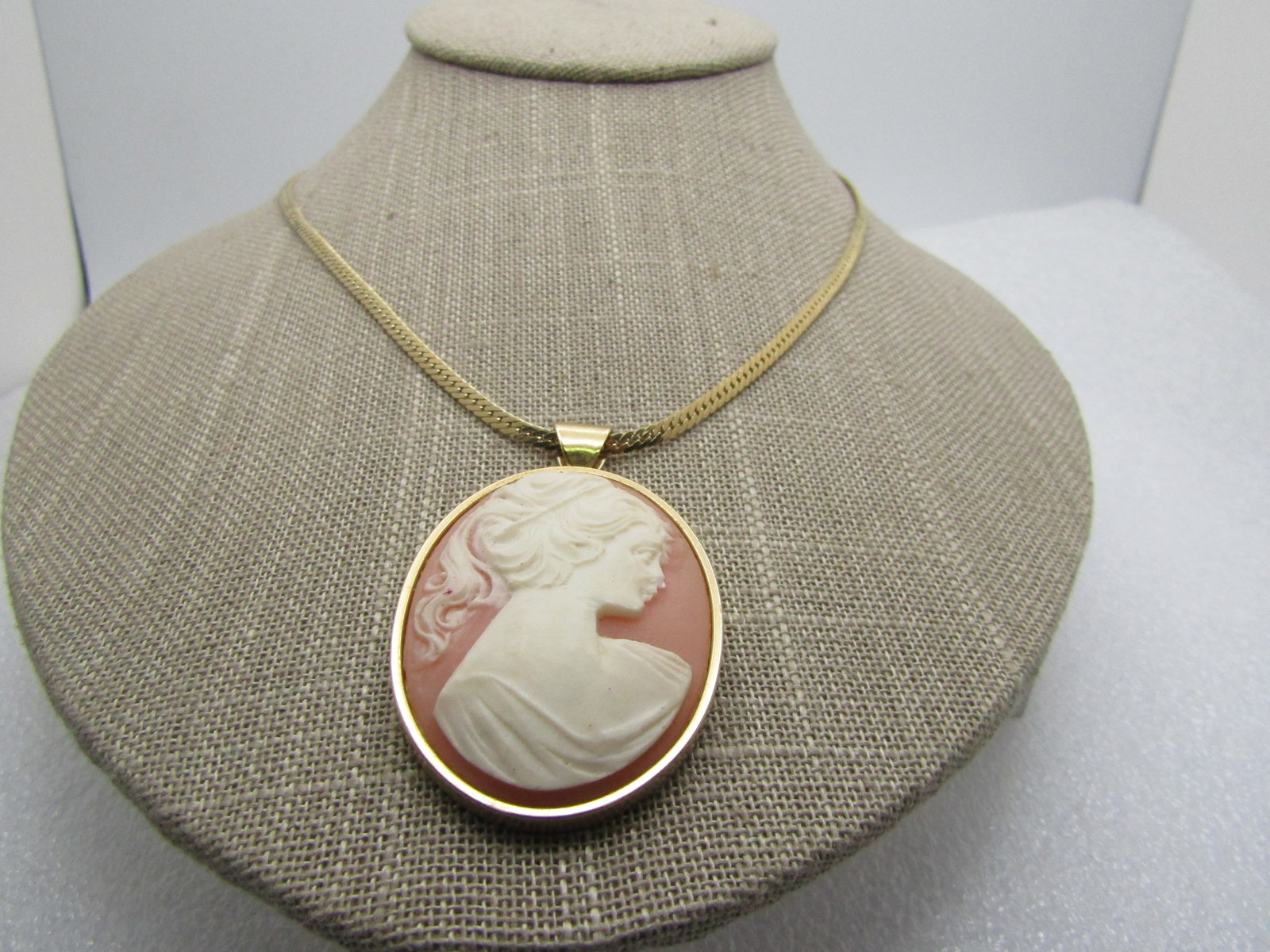 Vintage Cameo Necklace, 18", 2.5mm Herringbone Chain, 1960's-1970's: Vintage Cameo Necklace, 18", 1960's-1970's, 2.5mm Herringbone Chain that is signed American Showcase but is not original to the pendant. The chain is appx. 1980's and the pendant is appx. 1960's-1970'