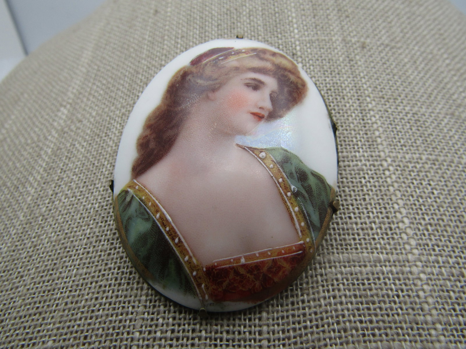 Vintage Porcelain Portrait Cameo Brooch, 1800's-1910's: Vintage Porcelain Portrait Cameo Brooch, 1800's-1910's. This does have a newer pinback put on the back - you can see the repair. It has a brass closed back with prongs holding the domed brooch that is