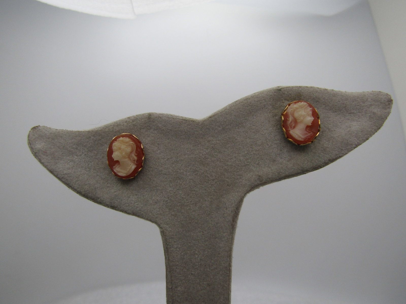 Vintage Costume Cameo Earrings, Green, 1960's: Vintage Costume Cameo Earrings, Green, 1960's. They are appx. 1/2" tall and 1/3" wide in an open scalloped bezel. They are not marked or signed. Gold tone. Very clean and in very good condition. The