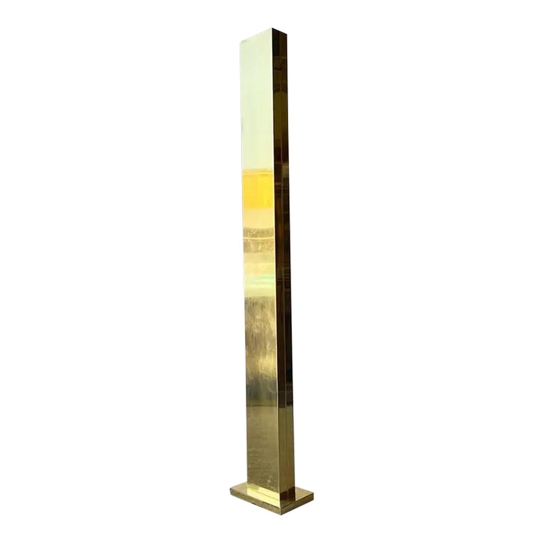 1970s Mid-Century Modern Casella Tourch Brass Skyscraper Floor Lamp: This 1970s Casella Brass Skyscraper Floor Lamp adds a striking vertical element to industrial interiors. With its sleek brass finish and towering geometric form, it evokes the clean lines and bold sca
