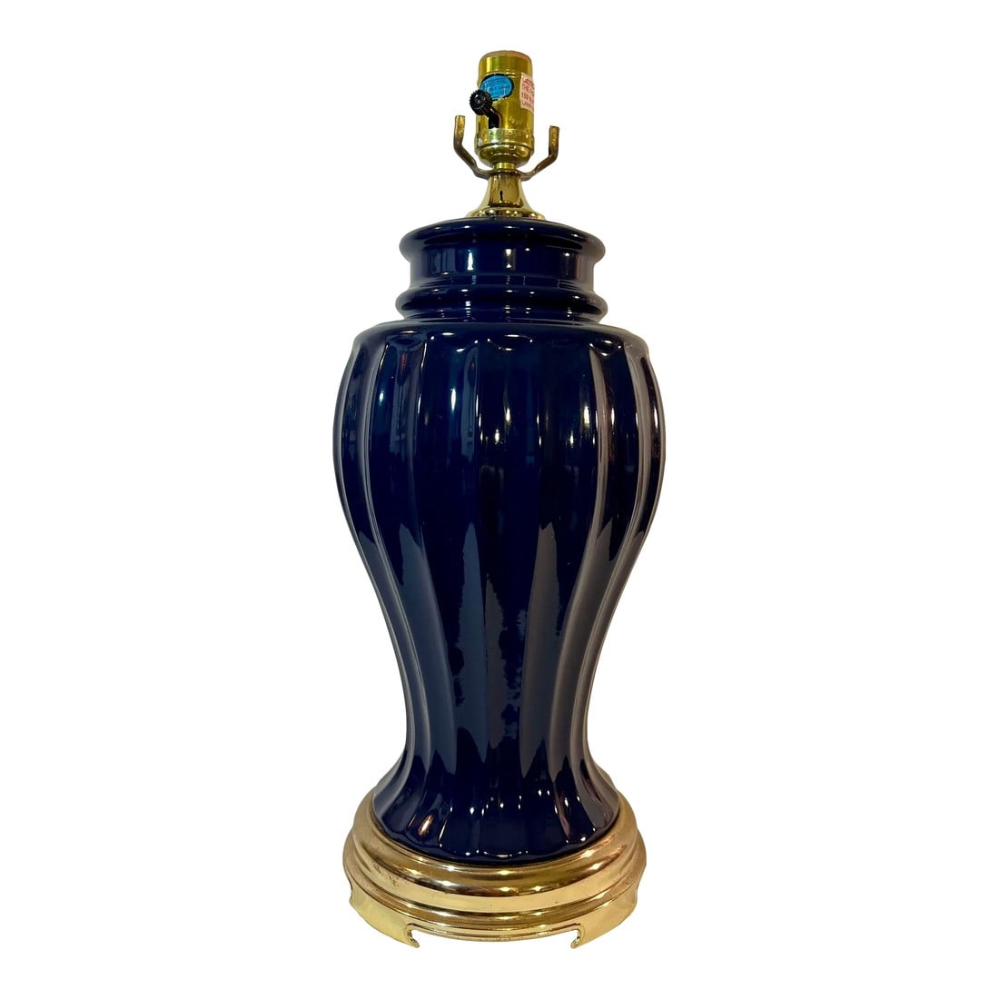 Vintage Hollywood Regency Cobalt Blue Fluted Ginger Jar Table Lamp on Brass Stand: Transform your space with this stunning Vintage Chinoiserie Cobalt Blue Fluted Ginger Jar Table Lamp, elegantly perched on a classic brass stand. This exquisite piece combines timeless charm with a