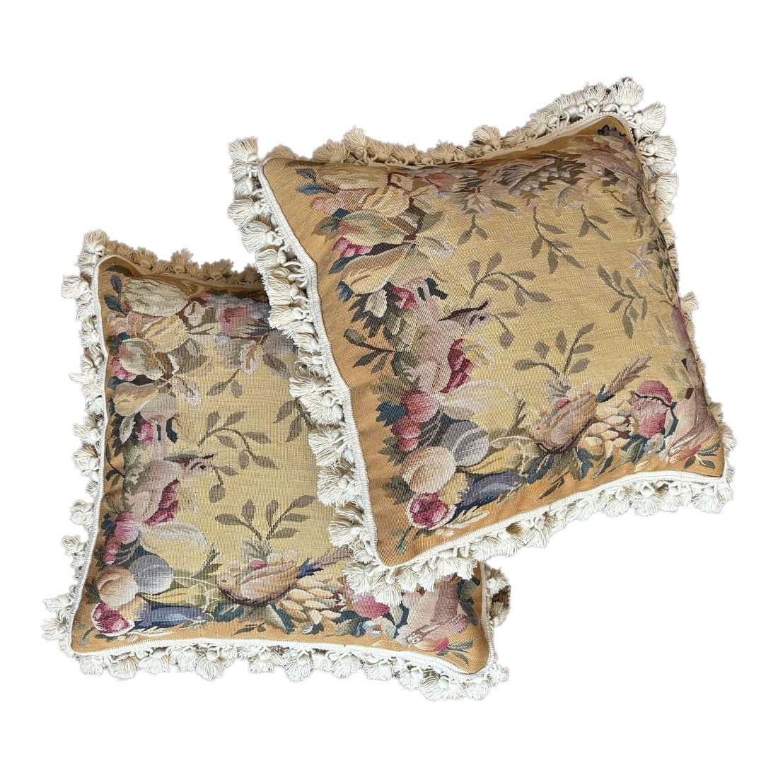 Antique Aubusson Tapestry Pillows, a Pair: Beautiful hand made antique needlepoint pillows in shades of soft yellow, cream, green, pink, and blue. Botanical style includes pomegranates, pears, and berries amidst leaves and doves. Backs are a c