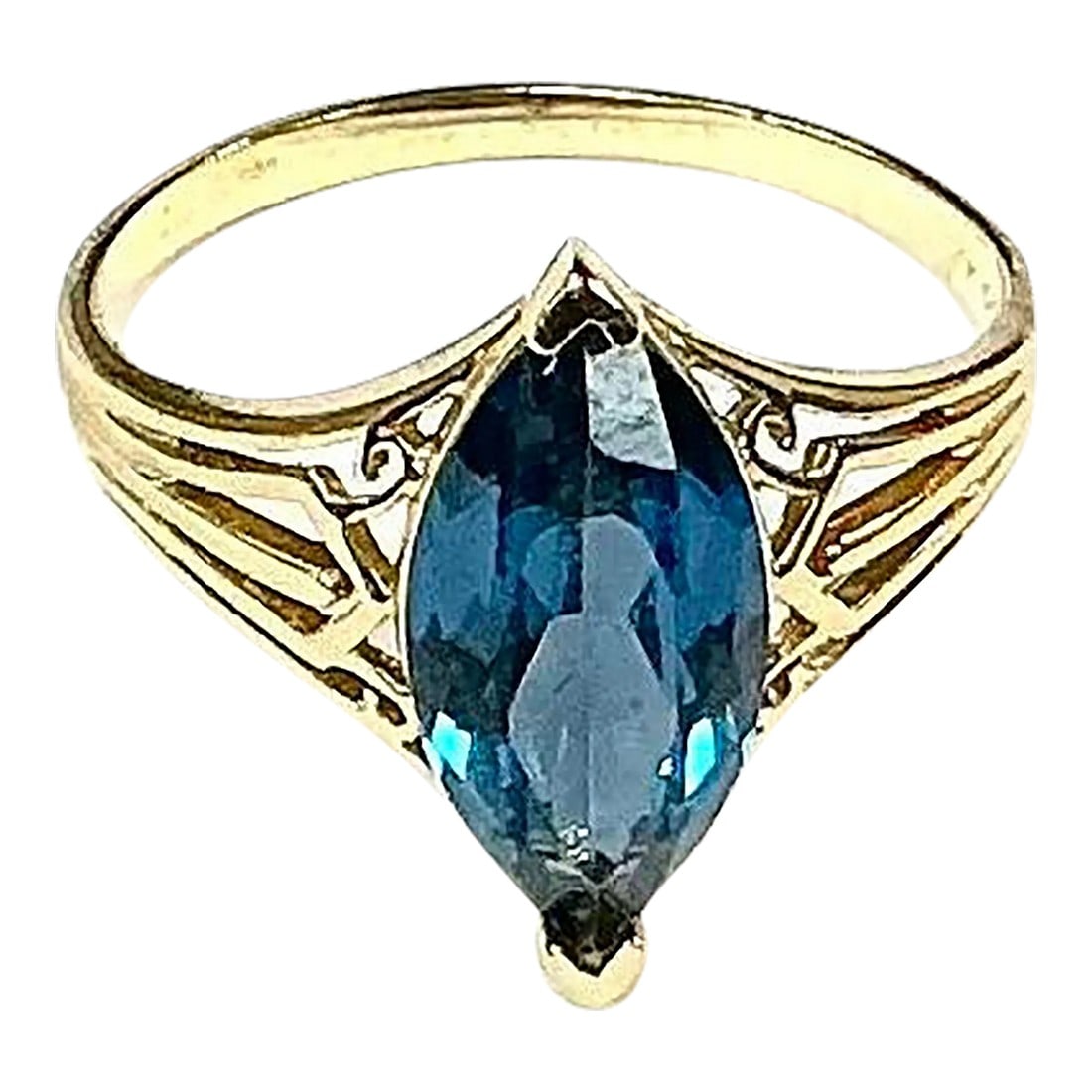 Marquise Blue Topaz 14k Yellow Gold Ring: 14k yellow gold marquise blue topaz ring, 3.10 Grams TW. The dimensions are approximately 14 mm x 7 mm. Approximately 3 carats. Marked 14k. Approximate size 7.5. Condition: Alterations: Original