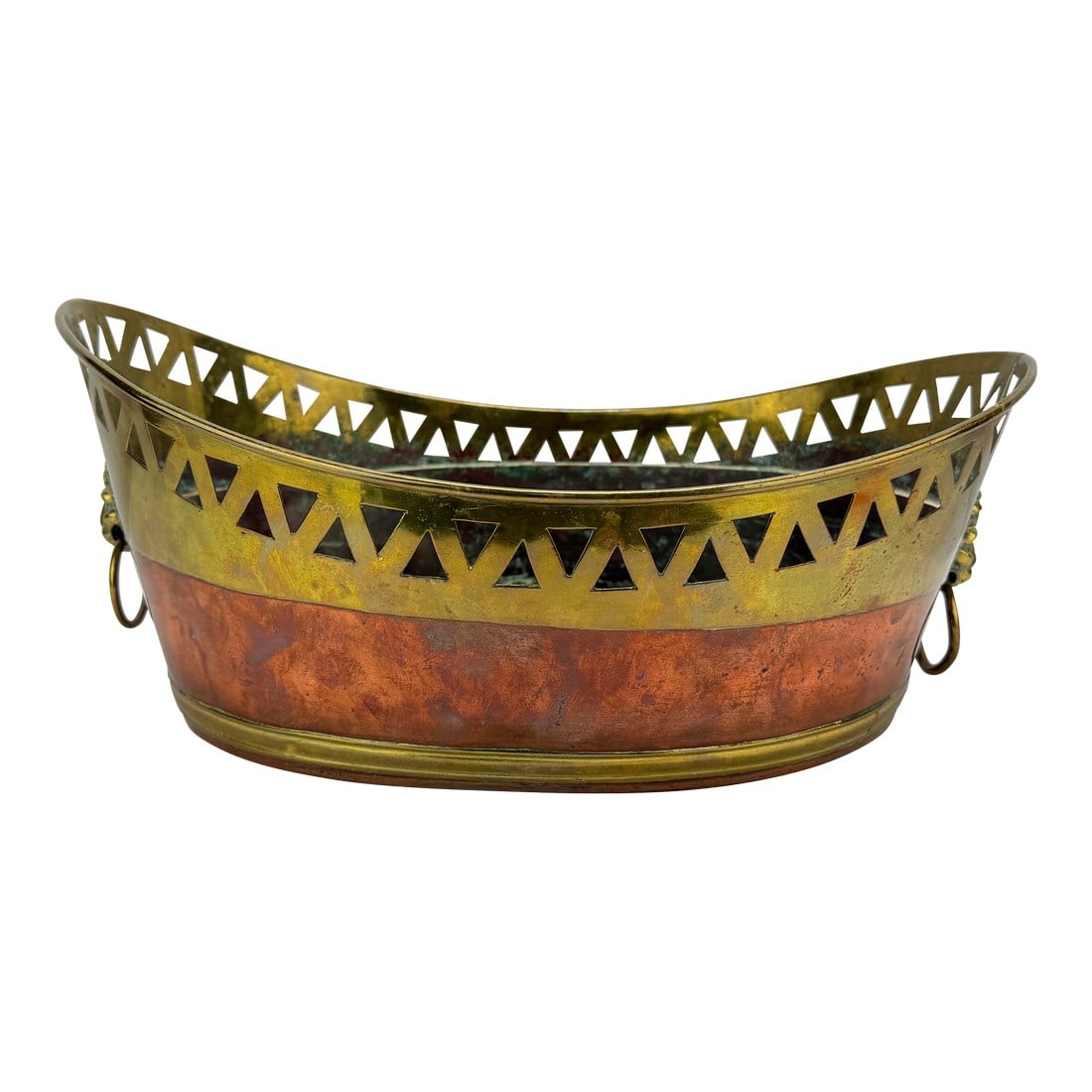 English 19th Century, Copper and Brass Jardinière or Wine Cooler W/ Lion Mounts: English, 19th century, an oval copper and brass jardinière or wine cooler of refined neoclassical taste, distinguished by its finely executed proportions and striking interplay of materials. The