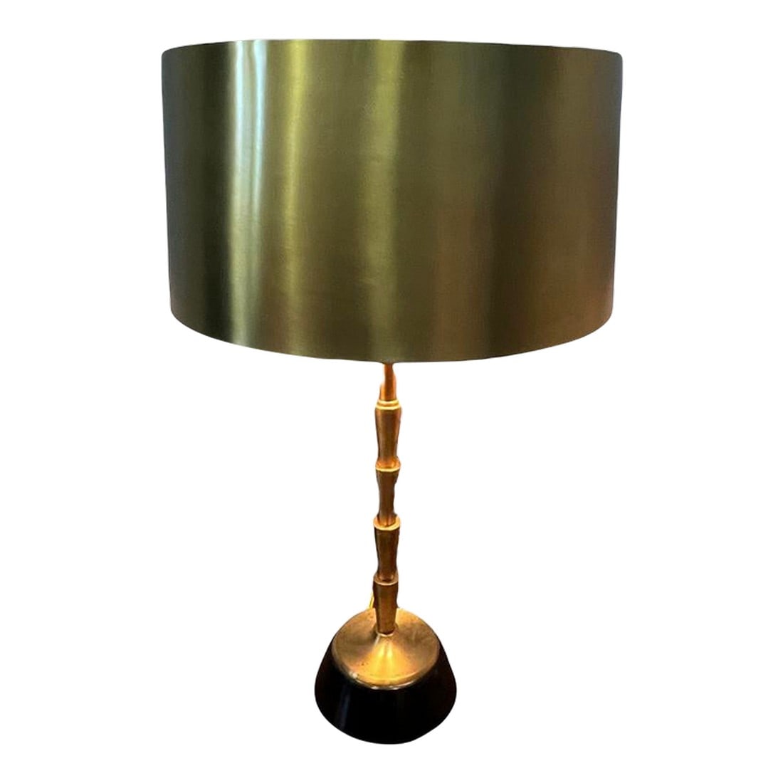 Global Views Brass Lamp With Brass Shade: Elevate your space with the Global Views Brass Lamp With Brass Shade, a striking fusion of modern elegance and timeless design. Crafted entirely from lustrous brass, this lamp features a sleek,