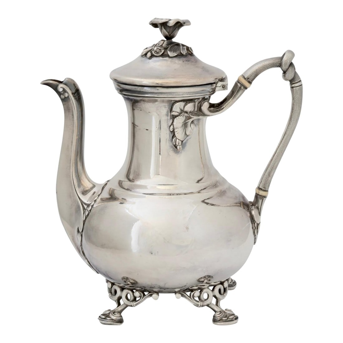 French Christofle Silverplate Coffee Pot: An elegant antique silver-plated coffee pot by Christofle, showcasing ornate Rococo details including a floral finial, scrolled feet, and a gracefully curved handle. Its lustrous finish and