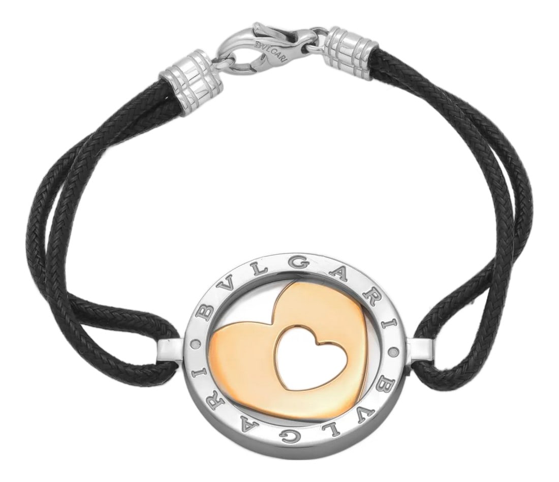 Bvlgari "Tondo" 18k Yellow Gold Stainless Steel Double Heart Cord Bracelet: A Modern Icon of Italian Craftsmanship and Romantic Design Introduce a bold, contemporary statement into your accessory lineup with this Bvlgari "Tondo" Double Heart Cord Bracelet, featuring a
