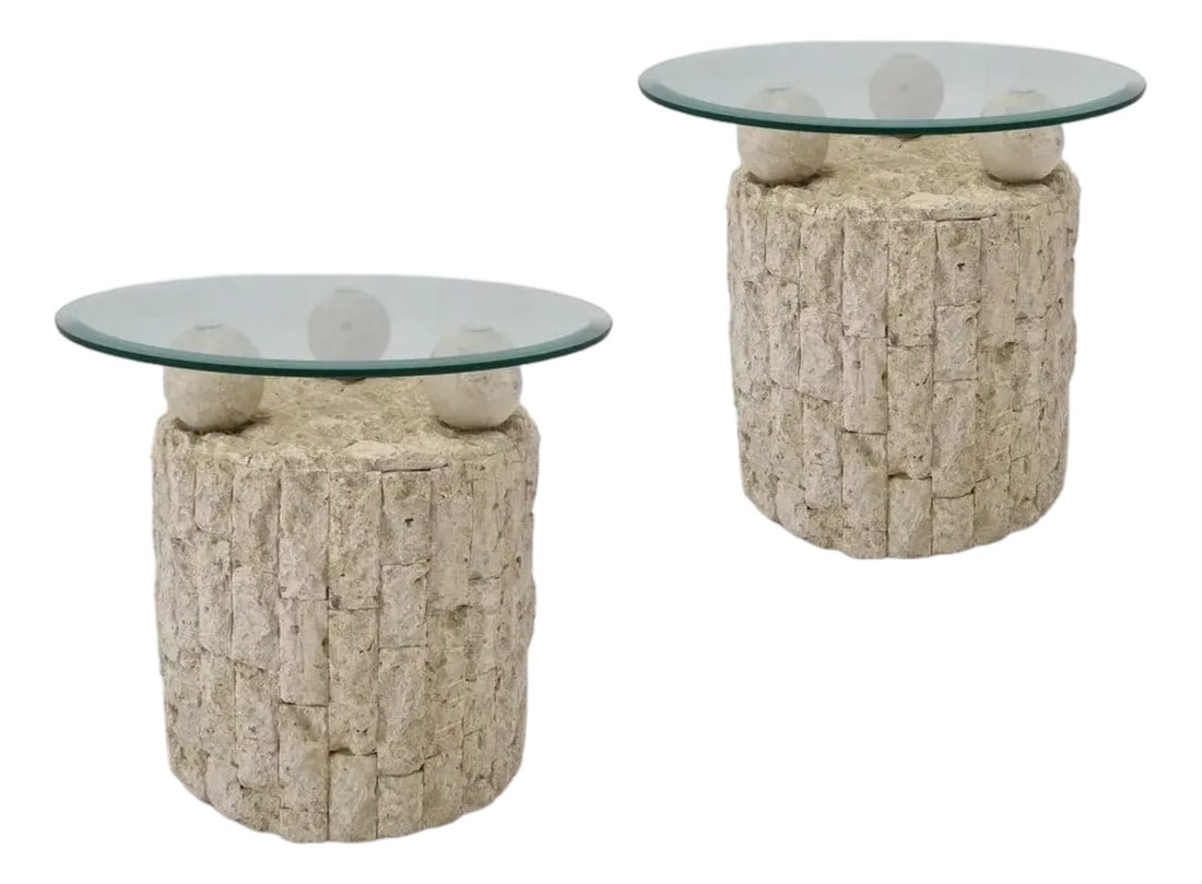 1980s Pair of Vintage, Postmodern Cylindrical Mactan Stone Side Tables: Pair of 1980s postmodern tessellated stone side tables. Each table features a circular stone base with a geometric inlay of varying tones and textures, topped with clear round glass. Three spherical s