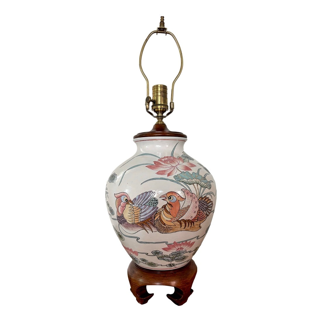 1980s Chinoiserie Style Wildwood Lamp With Lotus and Waterfowl Motif: Fine Chinoiserie Wildwood table lamp, featuring ivory background with motif of lotuses and waterfowl. Colors are peach, seafoam blue, brown and tan. Accented with beautiful walnut base and cap. Has 3 