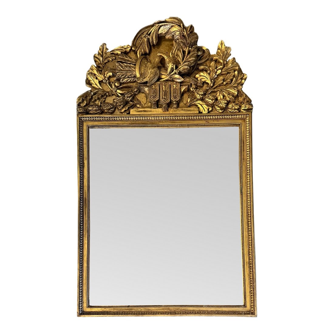 Large Carved Antique Regency Carved Wood Gold Mirror.. 64" Tall. Three Dimensional Carving Doves a: Large antique gold mirror- richly carved with doves of peace - and a unique 3D laurel branch. 64" tall 37" wide 6" deep Condition: Alterations: Original Condition Unaltered Imperfections: Some Imperfe