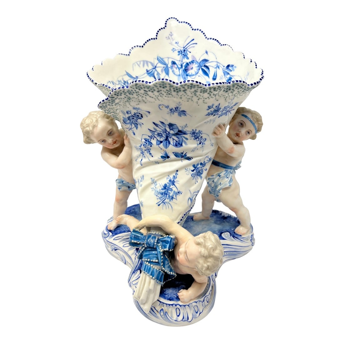 Antique Rococo-Revival Figural Spill Vase With Cherubs: Antique German Rococo-Revival figural porcelain spill vase. Blue and white floral painting, with dotted cobalt edging. A classic spill vase/mantel vase, designed to hold flowers or decorative spills.
