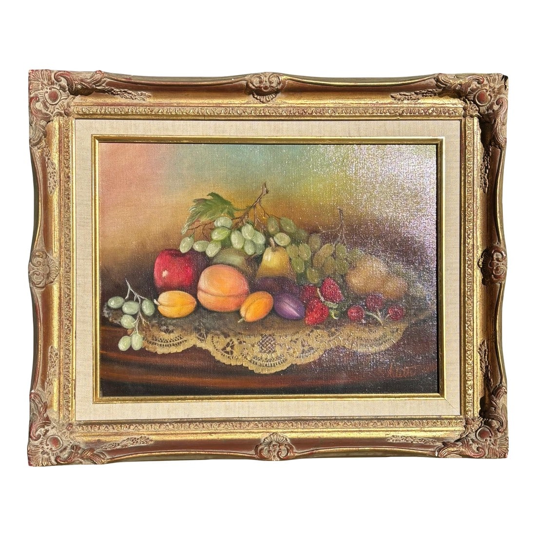 Fruit Still Life Oil Painting in Ornate Gilt Frame, Signed: Vintage oil painting on canvas depicting a traditional fruit still life arranged on a lace-covered surface. Signed lower right Arlette; the verso is additionally inscribed "Still Life with Old Lace"