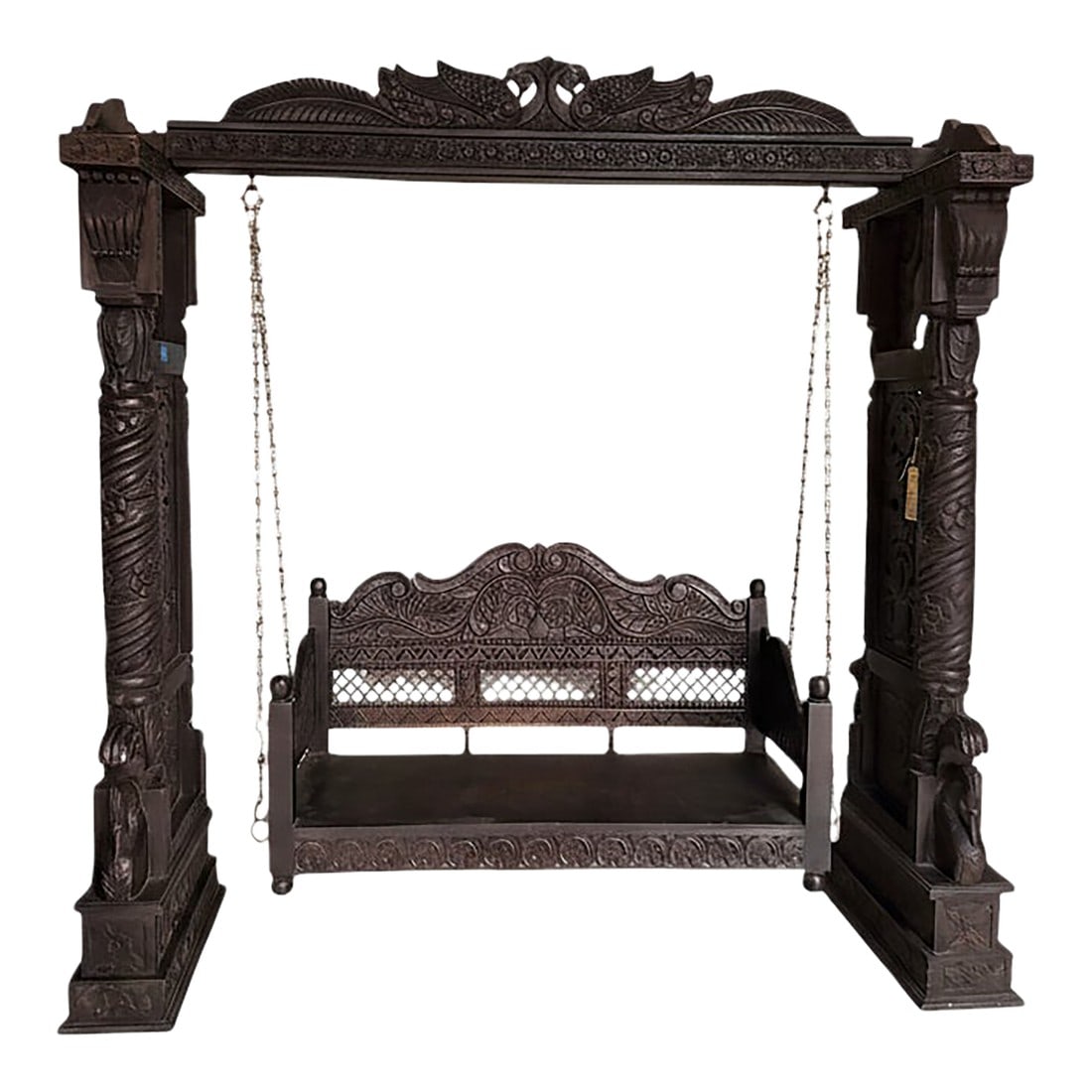 1990s Hand Carved Solid Wood Indian Swing: This hand carved solid wood Indian swing, also known as a traditional jhoola, is a striking blend of craftsmanship, comfort, and cultural charm. Expertly carved by skilled artisans, the swing