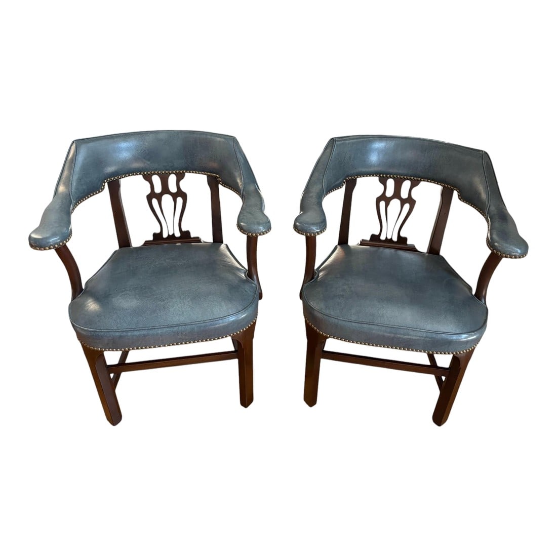 Late 20th Century Pair of Blue Leather Banker's Chairs Attributed to Barrit: Quick Hits: Set of 2 late 20th-century Barritt-attributed bankers chairs Classic design with slatted wood backrests Leather seats with brass nailhead trim Sturdy wooden frames with a rich dark finish
