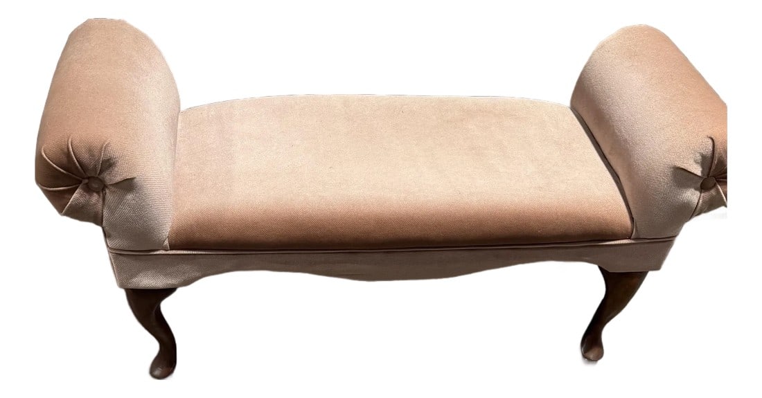 Mid 20th Century Dusty Pink Rolled Arm Accent Bench: This charming accent bench offers both aesthetic appeal and functional seating surface. This elegant bench features classic double rolled arms in a soft, plush dusty pink upholstery with gracefully