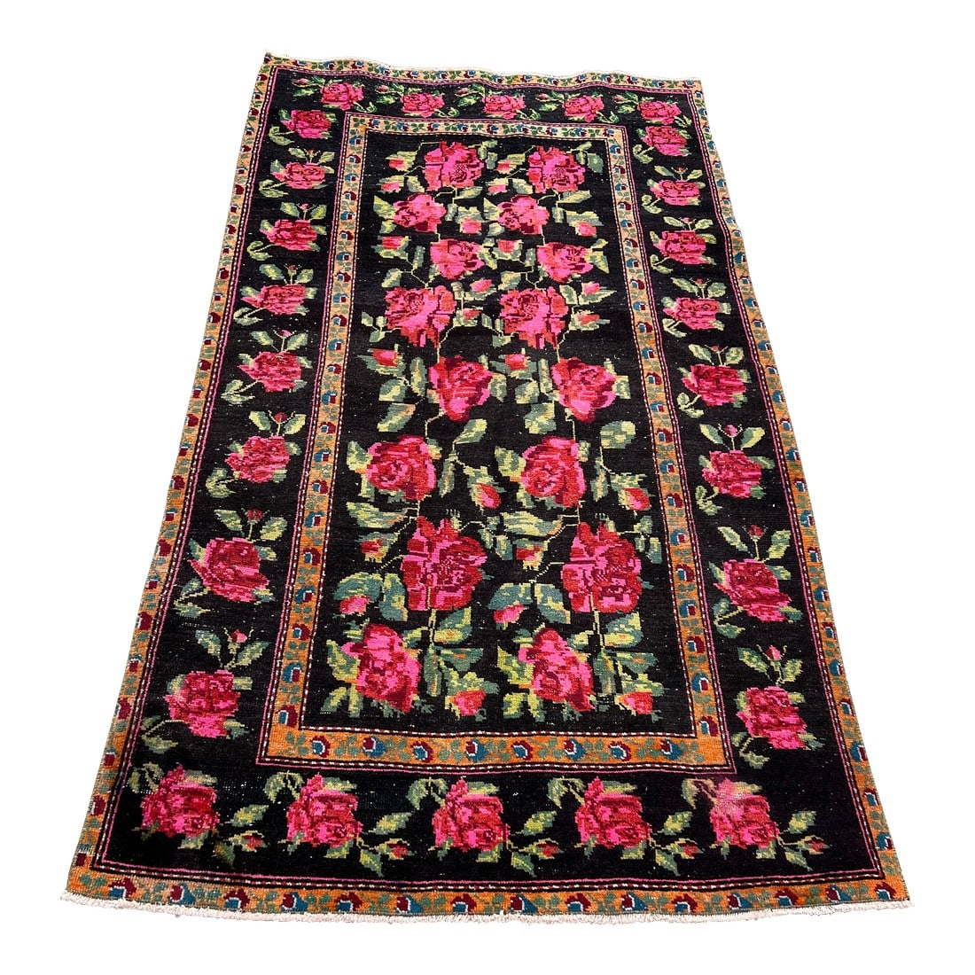 Vibrant 1940s Karabagh Rug, Bold Rose Motifs on Deep Black Field: All rugs have been professionally cleaned; original condition is not altered, age-related wear is considered normal in these unique, hand woven vintage rugs. It is common for slight variations in wear