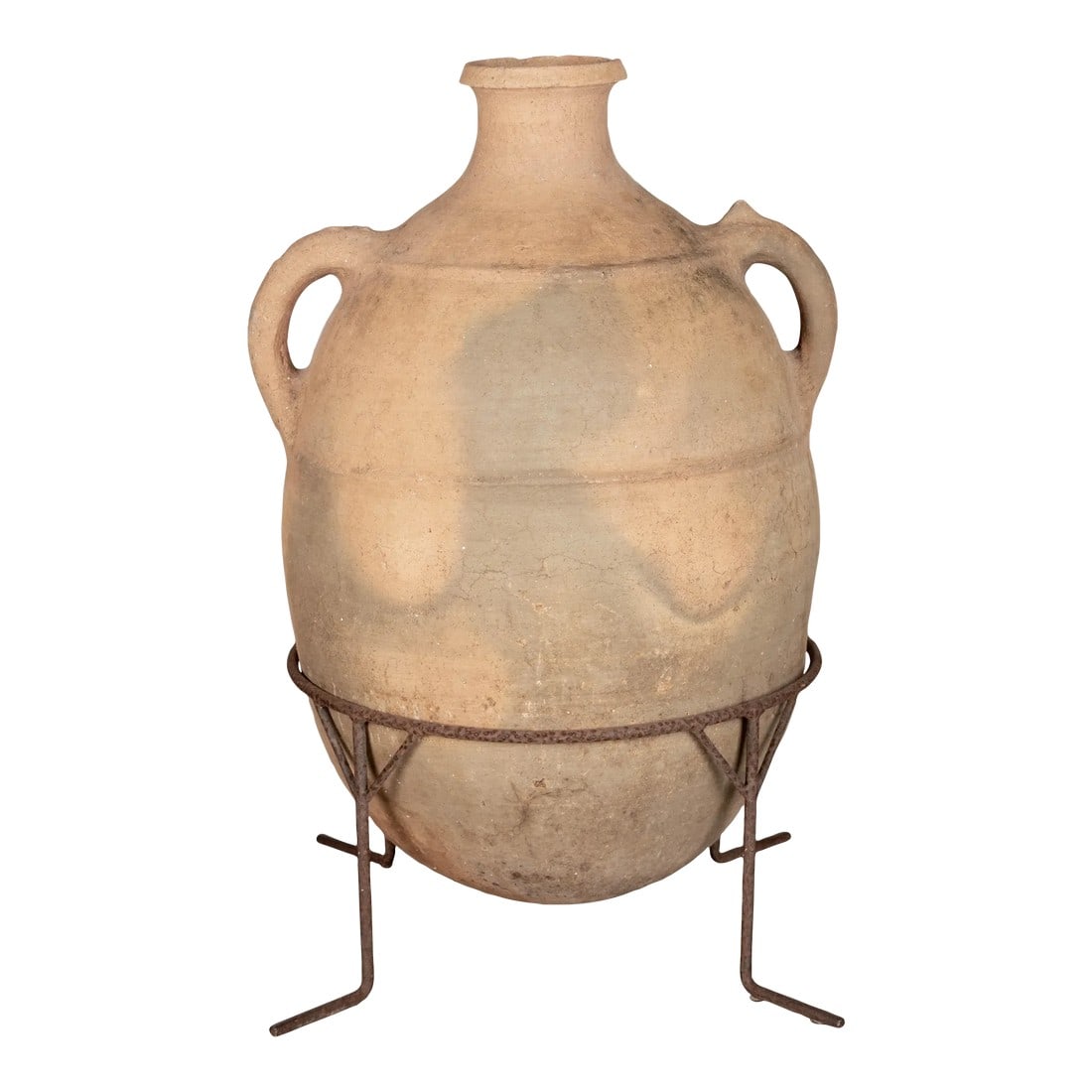 Large Moroccan Terracotta Pottery Water Jar in Iron Stand: A large Moroccan terracotta pottery water jar resting in an iron stand. Oval form with rounded bottom and two small handles. Iron has rusty patina. Minor chips. Beautiful clay color. Overall