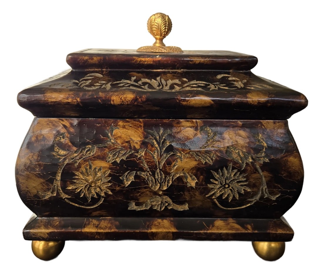 1980s Maitland Smith Ornate Hinged Mahogany Chest With Brass Ball Feet Leaf Finnial: The Maitland Smith Ornate Hinged Mahogany Box with Brass Ball Feet & Finial is a large, rectangle-shaped decorative box perfect for all occasions. Handmade with a mahogany walnut wood finish and
