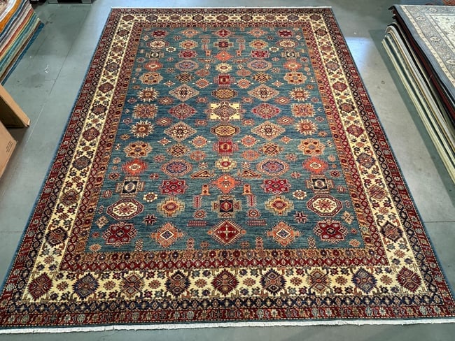 Fine Super Kazak Rug 10x13: Title:Fine Super Kazak Rug 10x13 Description:10' X13' Super quality Kazak Rug, hand spun and hand knotted rug in Pakistan 100% Vegge Dye natural wool pile , in silky high sheen blue teal and multi