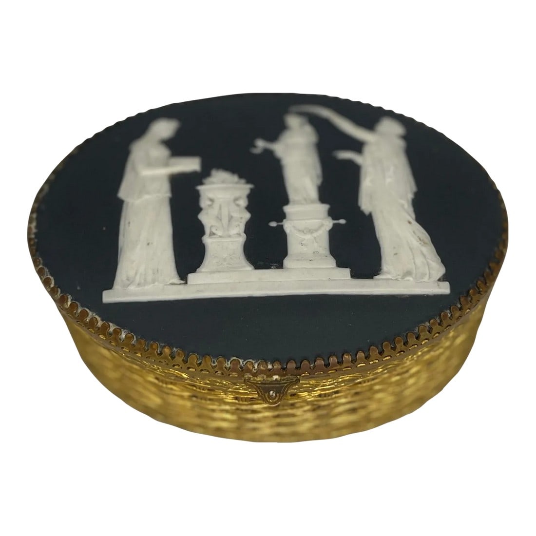 Antique Continental Basalt & Brass Basketweave Box - Possibly Wedgwood: Continental, early 20th century. A antique oval box made of brass and other metals. The box has a basketweave pattern to the exterior and an affixed basalt plaque to the top. The plaque has not been