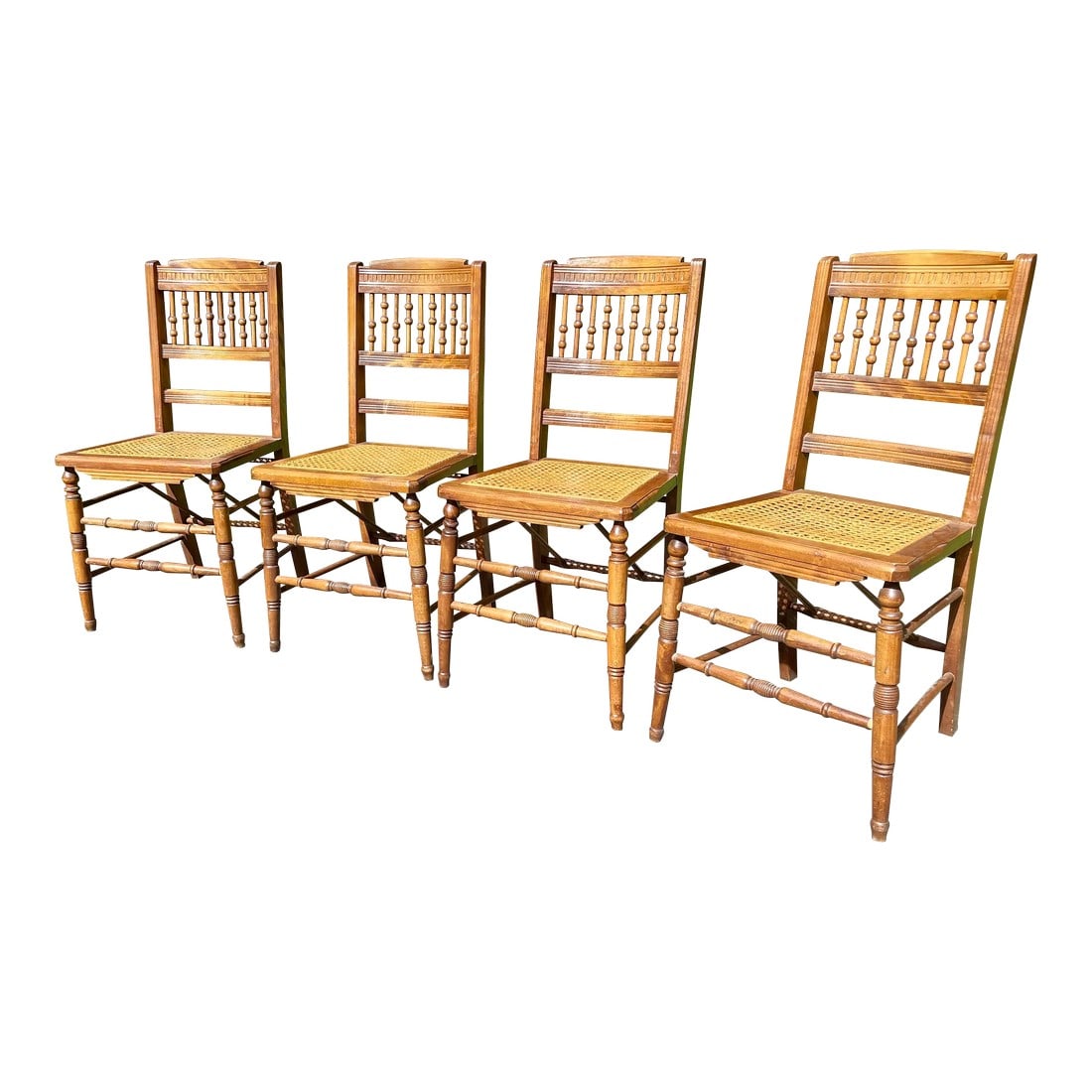 Ball and Stick, Antique Pressed Back Chairs With Cane Seats - Set of 4: Offered are four half spindle, ball and stick, pressed back oak chairs with caned seats. Ball and stick was very popular in the late Victorian and into the early 1900's. These chairs in very good