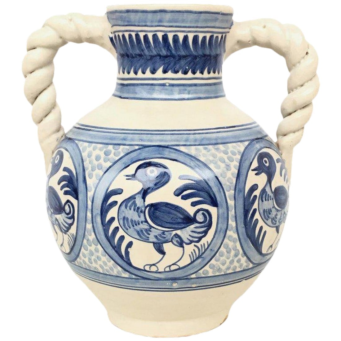 20th Century Glazed Earthenware Spanish Blue and White Painted Urn, Vase: About A striking Spanish glazed earthenware two-handled blue and white painted urn with foliate molded handles, the body underglaze blue ducks decorated very tipycal of this region. Talavera de la
