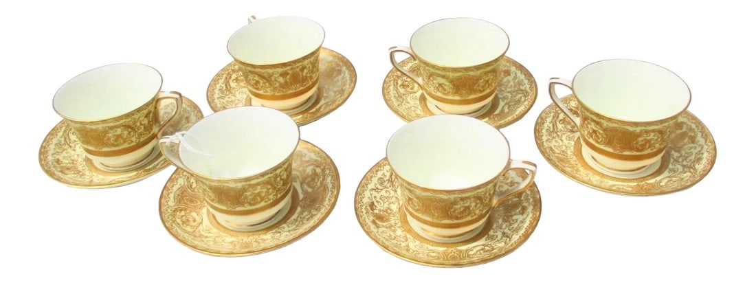 Royal Worcester Embassy Pattern Demitas Set - Set of 12: Demitas set from Royal Worcester. Service of 6 settings of Bone China. Embassy Pattern Cream color with gold design around saucer and cup body.Size 4.6" diameter of the saucer, cup 3" diameter.