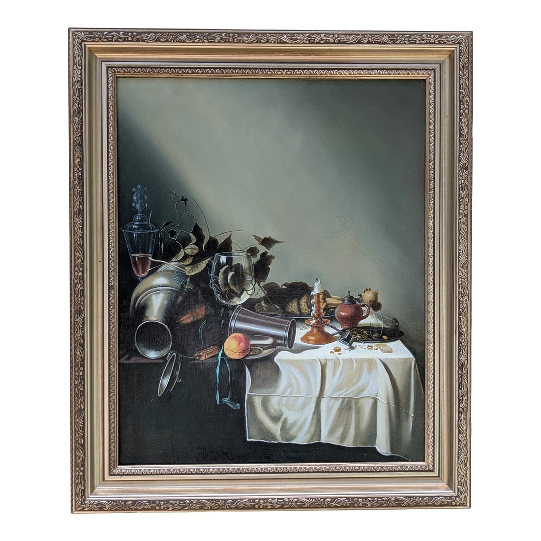 Framed Signed Still Life Oil Painting on Canvas – 20"x24" Classical Realism: Beautifully detailed signed still life oil painting on canvas, framed and measuring 20" x 24". The composition showcases a dramatic tabletop arrangement of pewter vessels, fruit, and glassware under